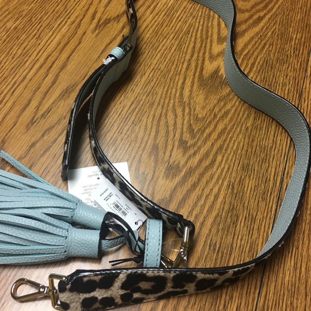 Kate Spade leopard strap/tassel pack
